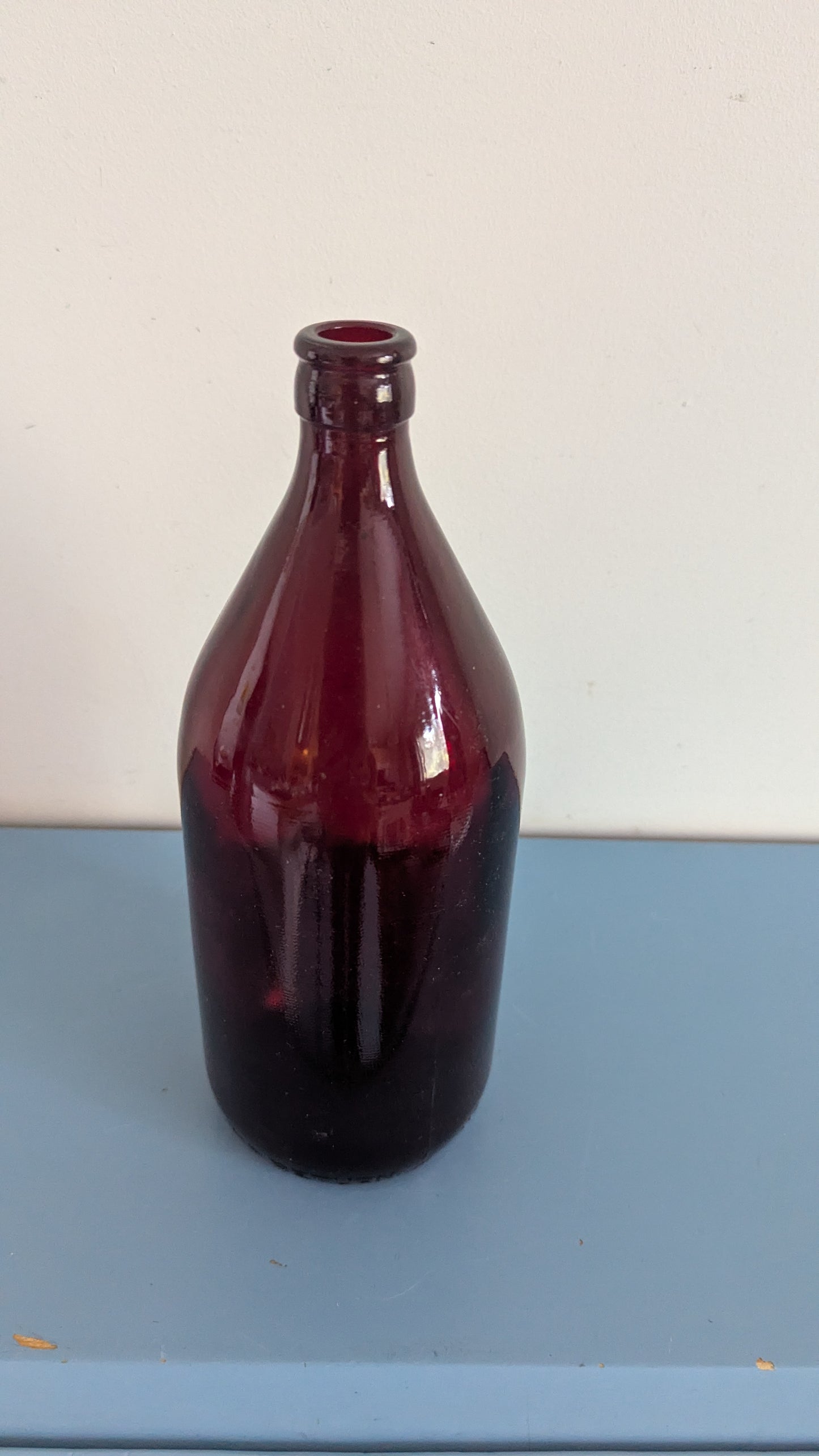 Anchor Hocking - Royal Ruby Olutpullo / Schlitz-pullo (1949–1963. 1 Litra)